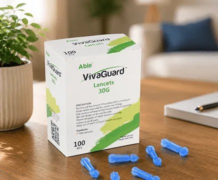 A box of VivaGuard 30G lancets with lancets beside it.